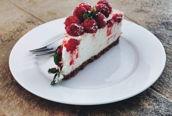 strawberry cake on white ceramic plate